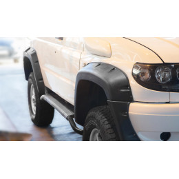 Расширители колёсных арок УАЗ Патриот (с накладками на оба бампера) дорестайлинг